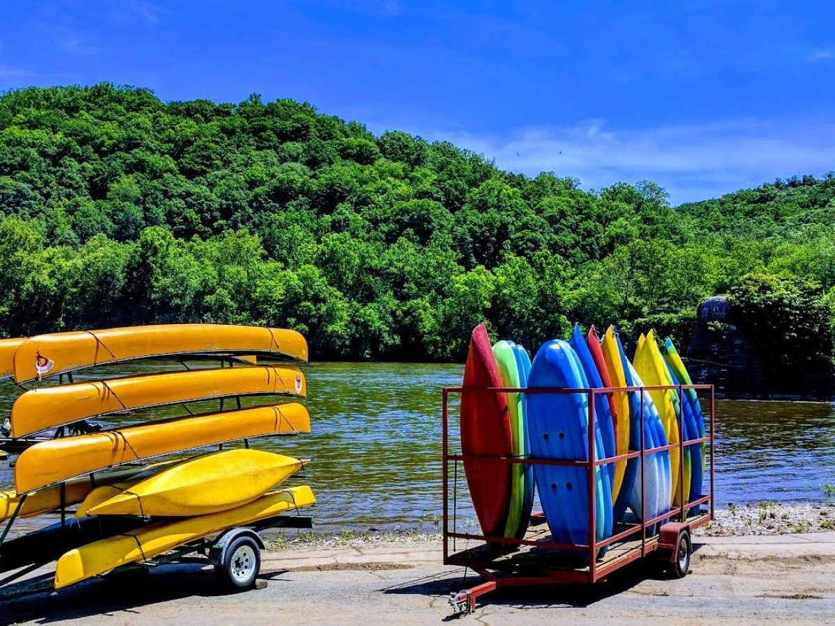 a group of people sitting at a beach