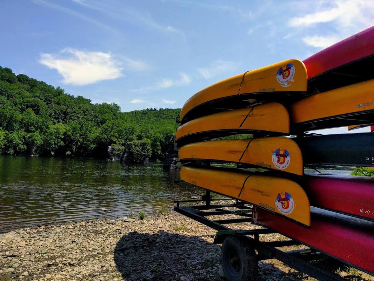 a boat sitting on top of a beach