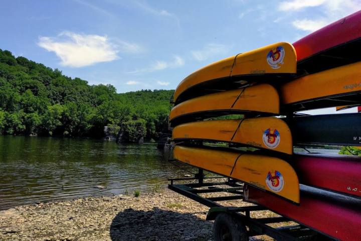 a boat sitting on top of a beach