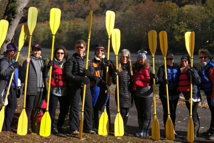 a group of people posing for the camera