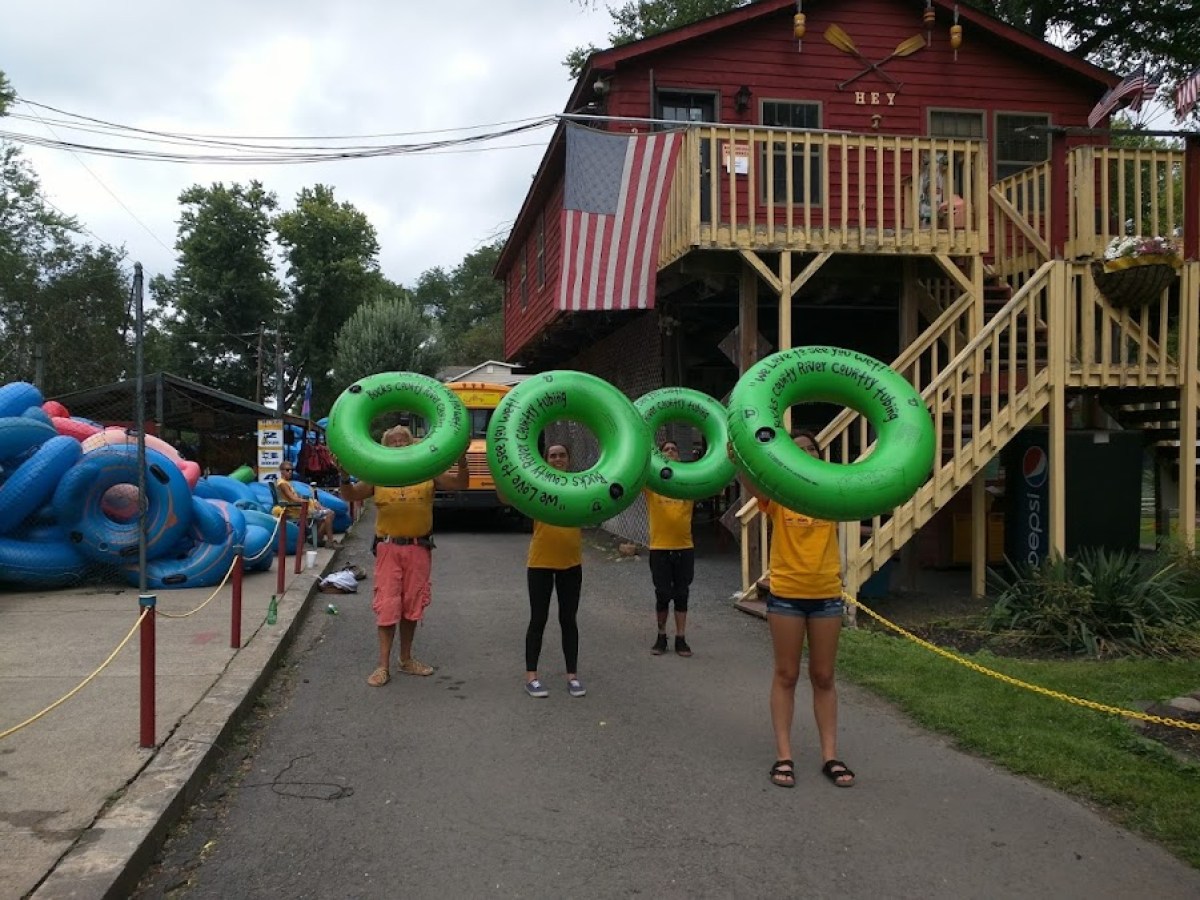 a group of people standing in front of a building
