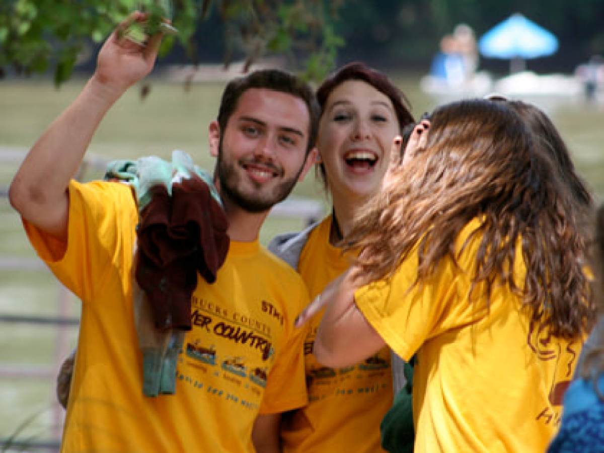 a group of people posing for the camera