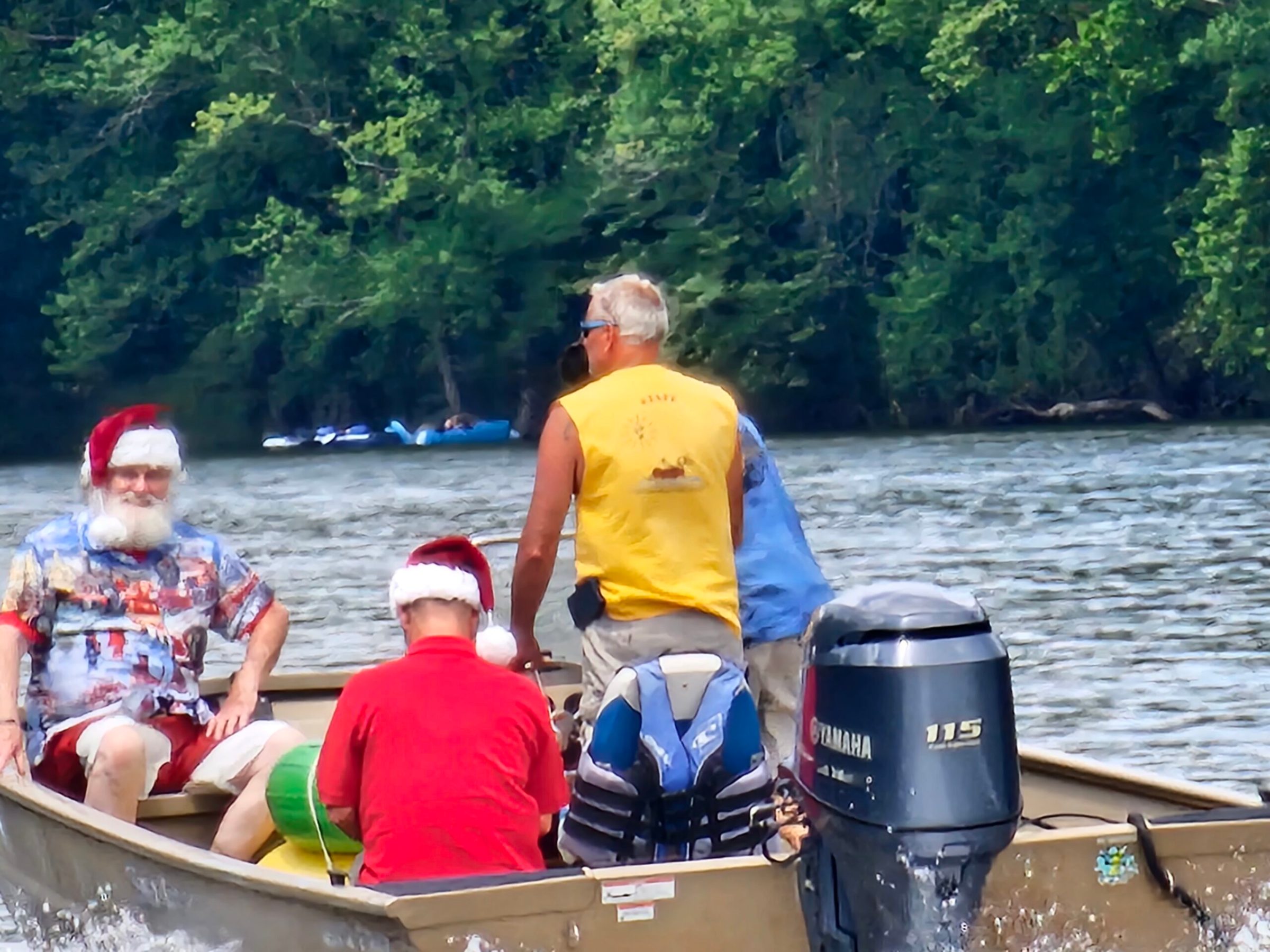 a group of people riding on the back of a boat