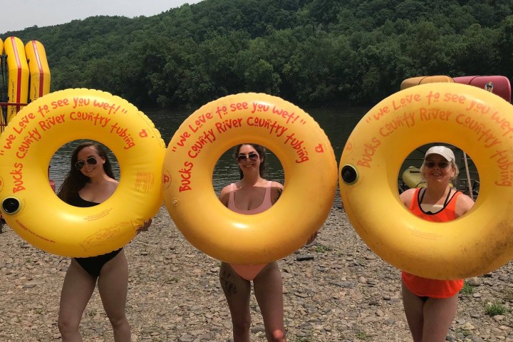 a person holding a donut