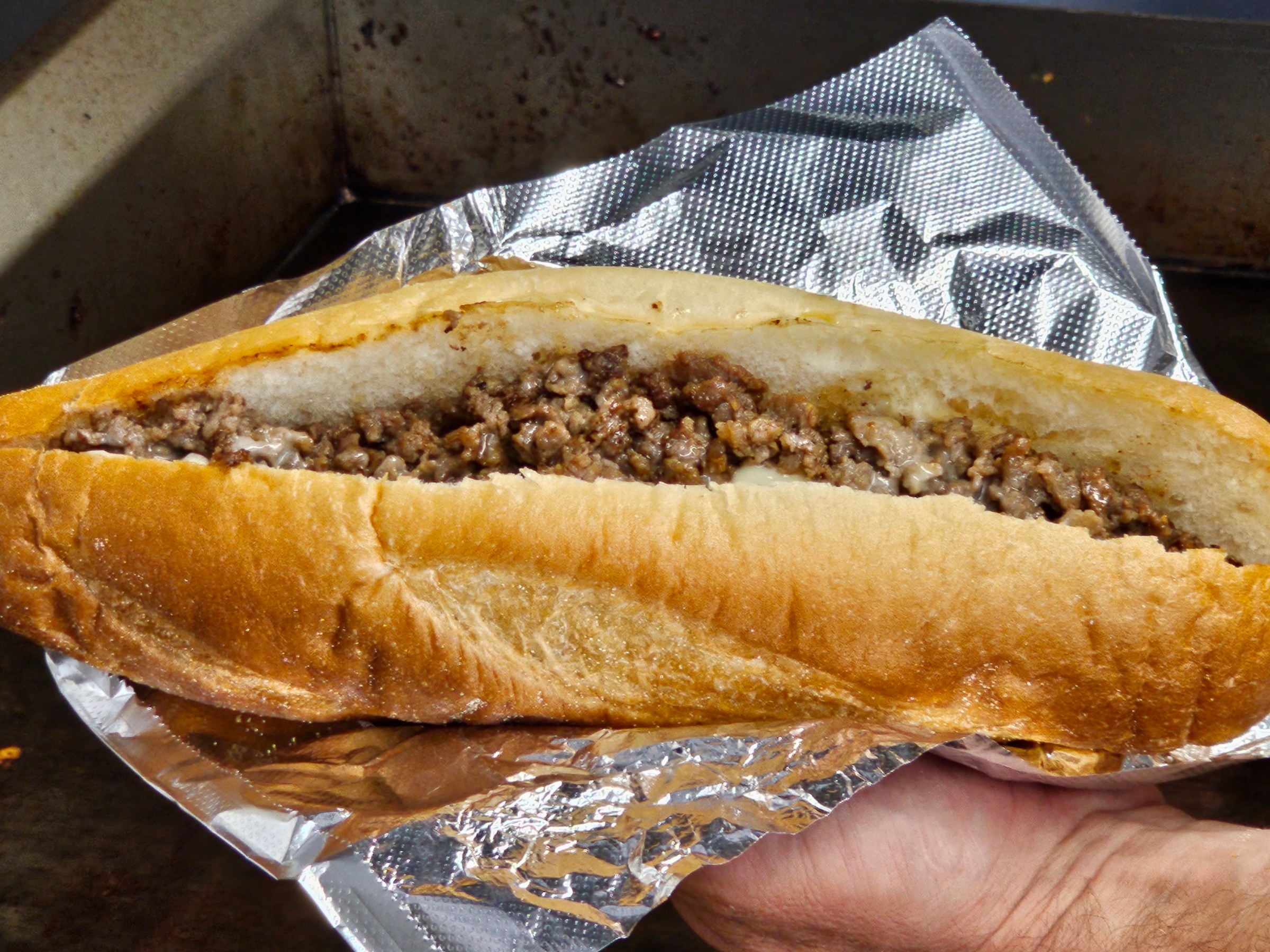 a sandwich sitting on top of a hot dog